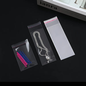 100pcs Opp Self Adhesive Bag Long Transparent Packaging Bags Universal Dust Water Proof Wrapping Material